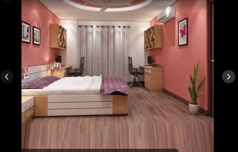 Bedroom with coral walls and study workstation