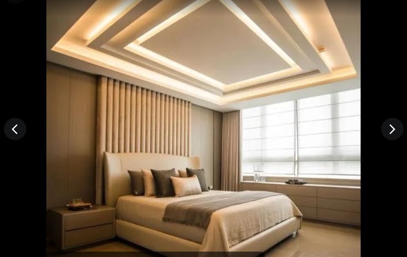 Bedroom with floating platform bed and warm lighting